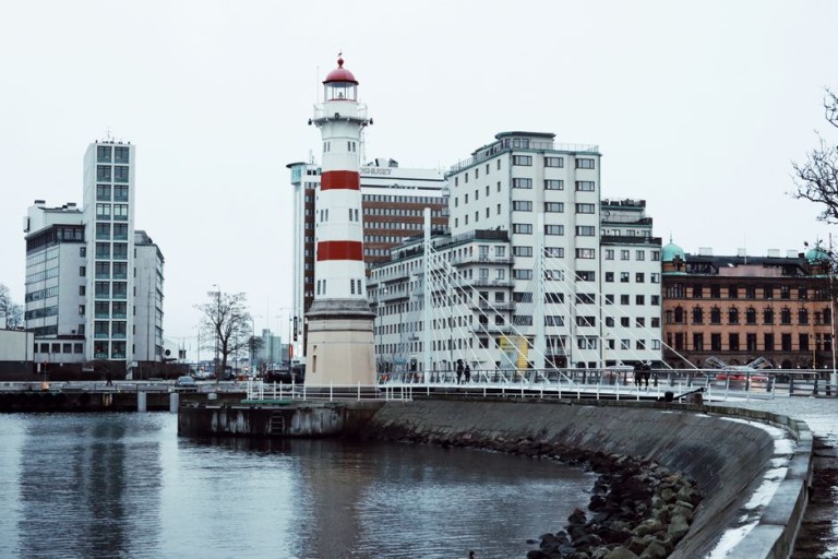 pexels-photo-30452426-30452426 Lighthouse with urban skyline in Malmö, Sweden on a winter day.